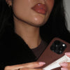 model holding her phone with fall lip case espresso and cinnamon roll plt