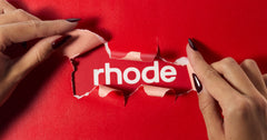 rhode logo with red background